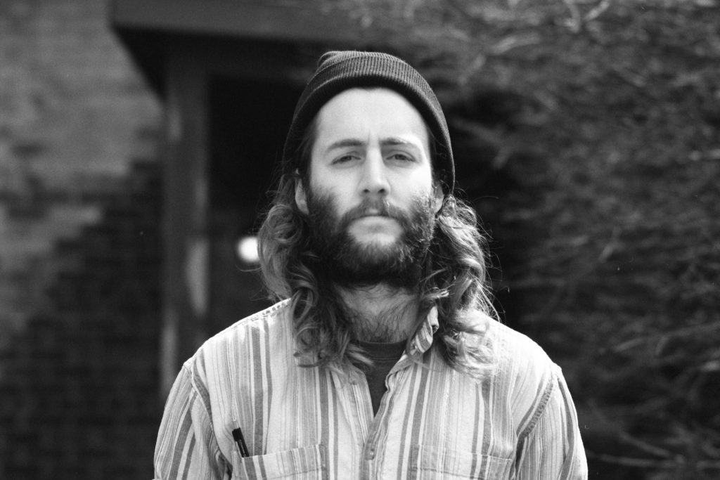 Portrait of a man for a B&W film comparison - Ilford Delta 3200 Pulled vs Ilford HP5 Pushed by James Baturin on Shoot It With Film