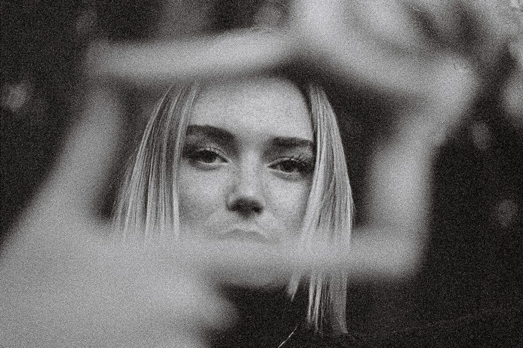 35mm black and white film portrait of a woman - Grainy Sundays by Lance James Daniels on Shoot It With Film