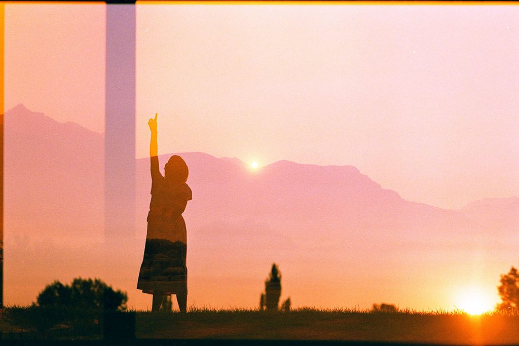 EBS double exposure of a child and the mountains - Experimental Film Photography: A Photo Essay by Cami Turpin on Shoot It With Film