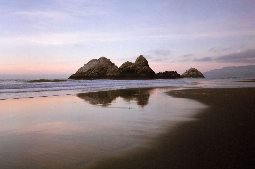 35mm film image of an ocean landscape - 6 Tips for Buying and Shooting the Leica M6 on Shoot It With Film