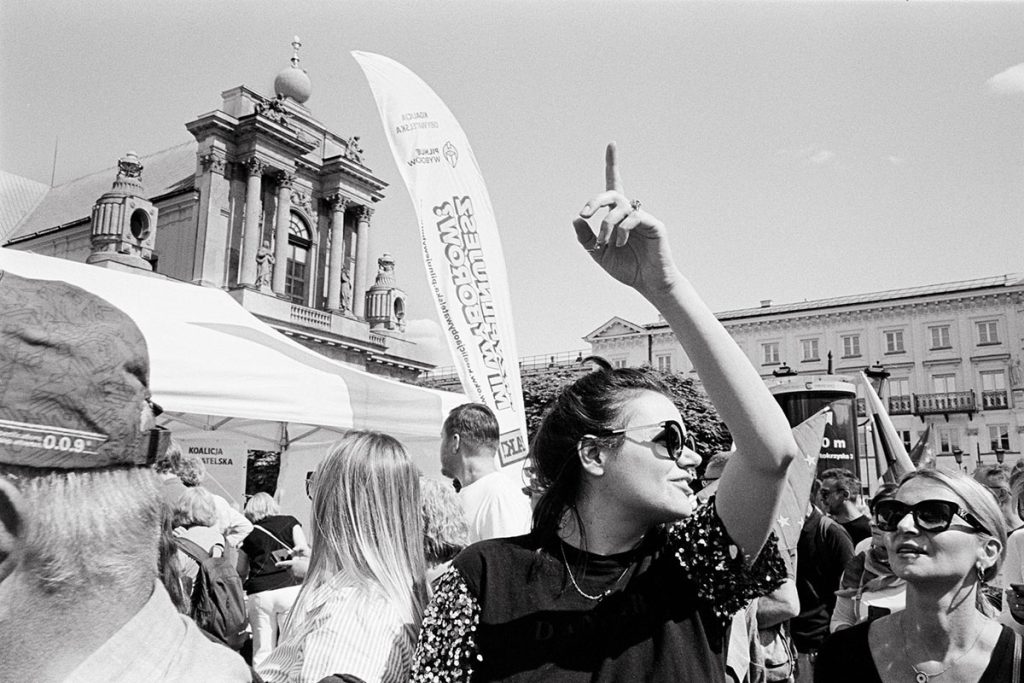 35mm film image of street photography in a large crowd by Neil Milton on Shoot It With Film